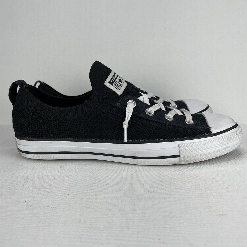 Converse Black Sneakers with White Accents and Low-Top Design